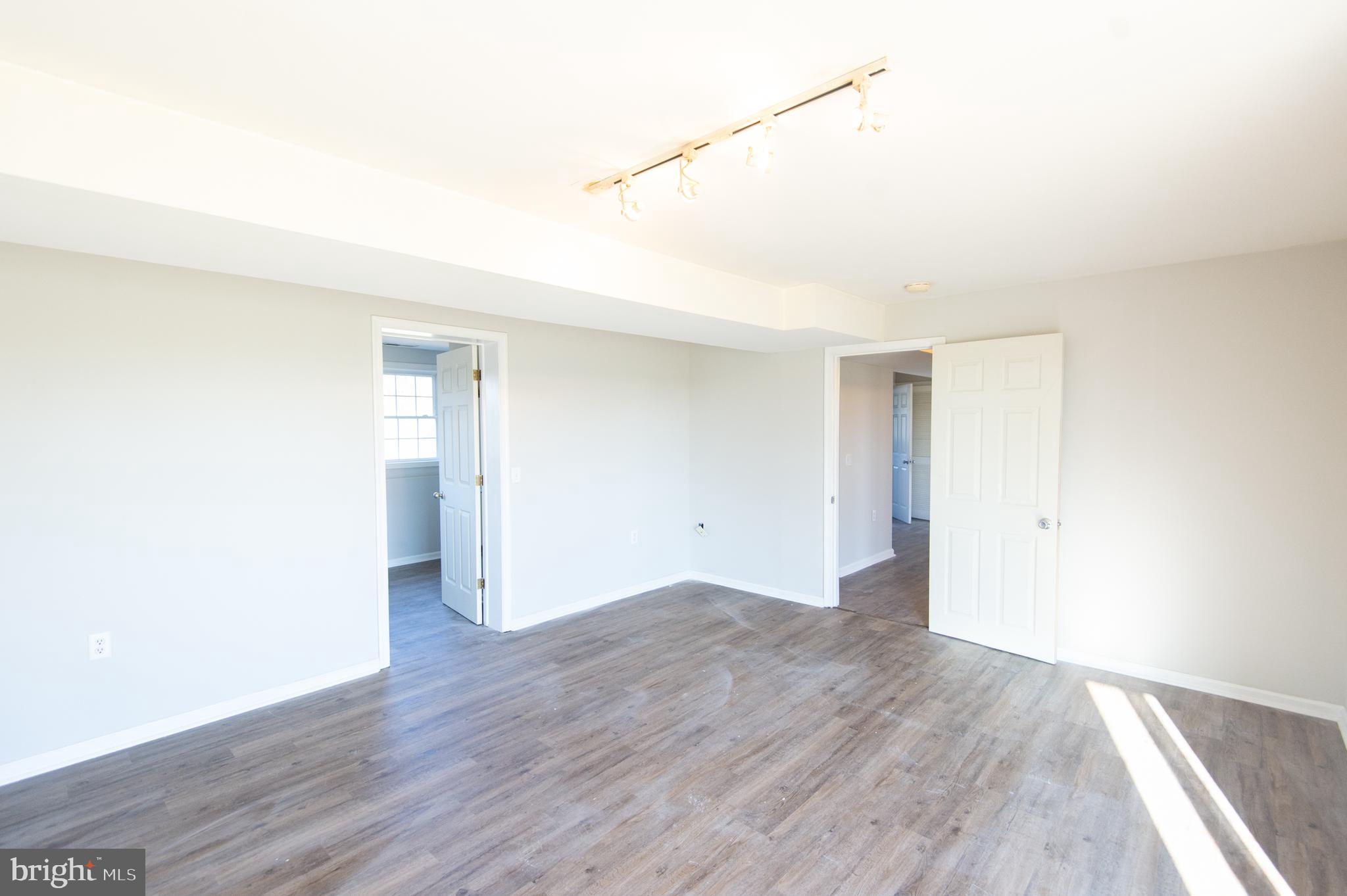 4321 Dolby Farm Road Hurlock, MD 21643 - Photo 14 of 35 lower level bedroom with bath