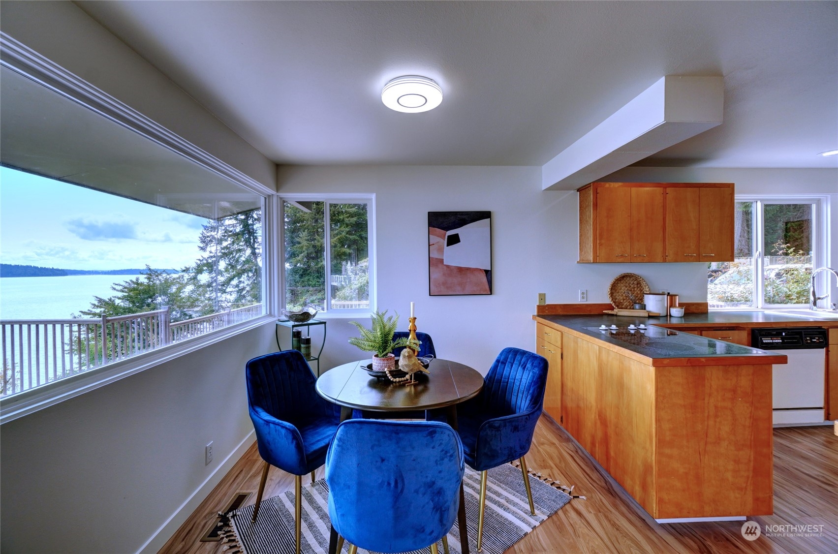 12922 Thomas Road Northwest Gig Harbor, WA 98329 - Photo 12 of 38 a view of a dining room with furniture window and outside view