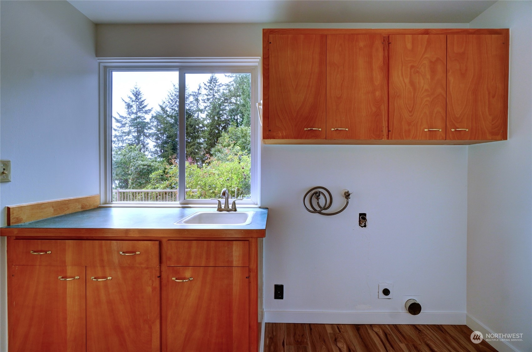 12922 Thomas Road Northwest Gig Harbor, WA 98329 - Photo 13 of 38 a view of a kitchen with a window