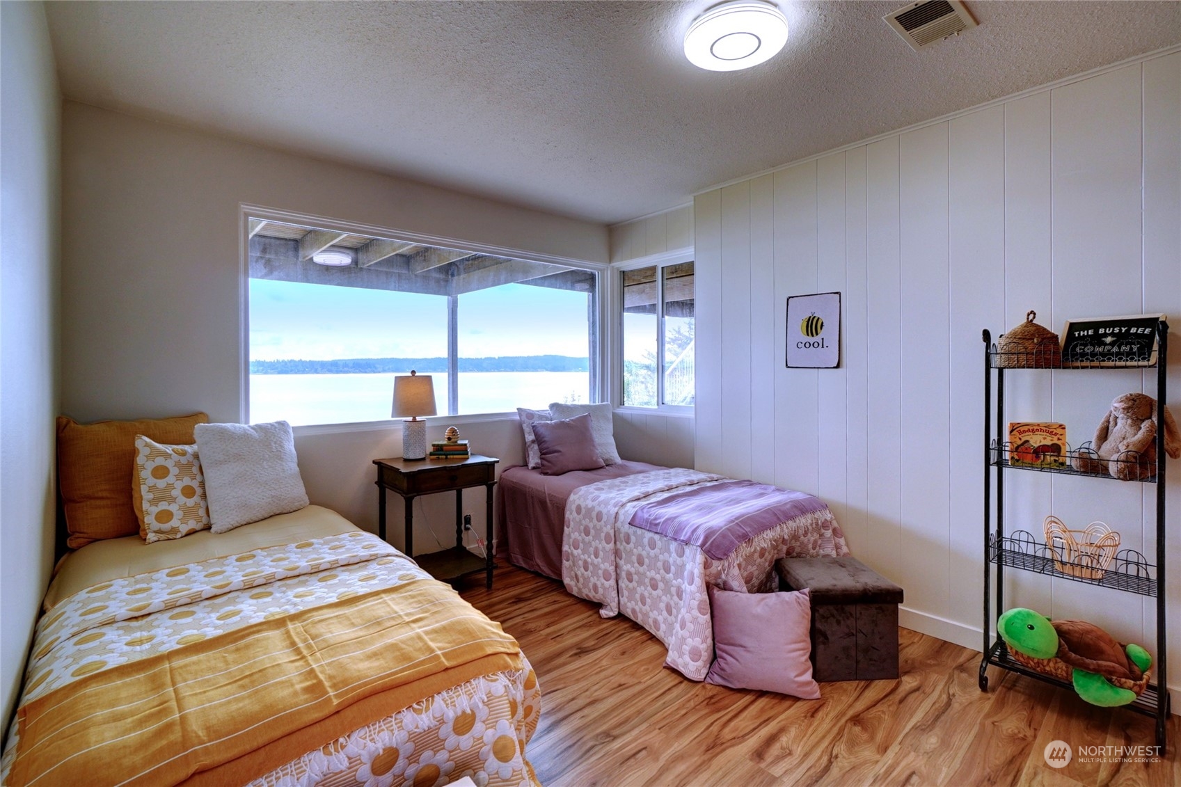 12922 Thomas Road Northwest Gig Harbor, WA 98329 - Photo 23 of 38 a bedroom with two beds and a window