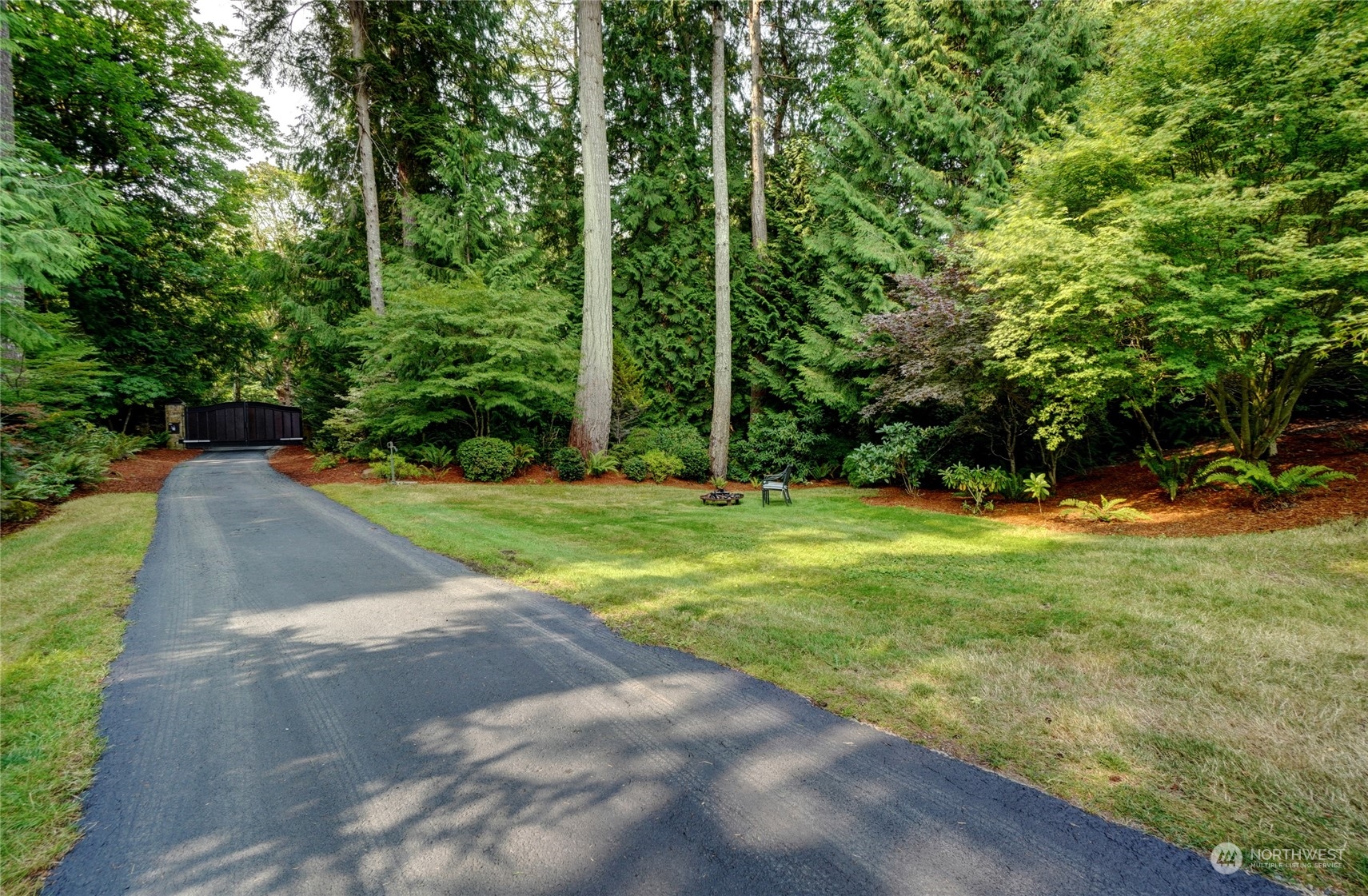 12922 Thomas Road Northwest Gig Harbor, WA 98329 - Photo 28 of 38 a view of a park with large trees