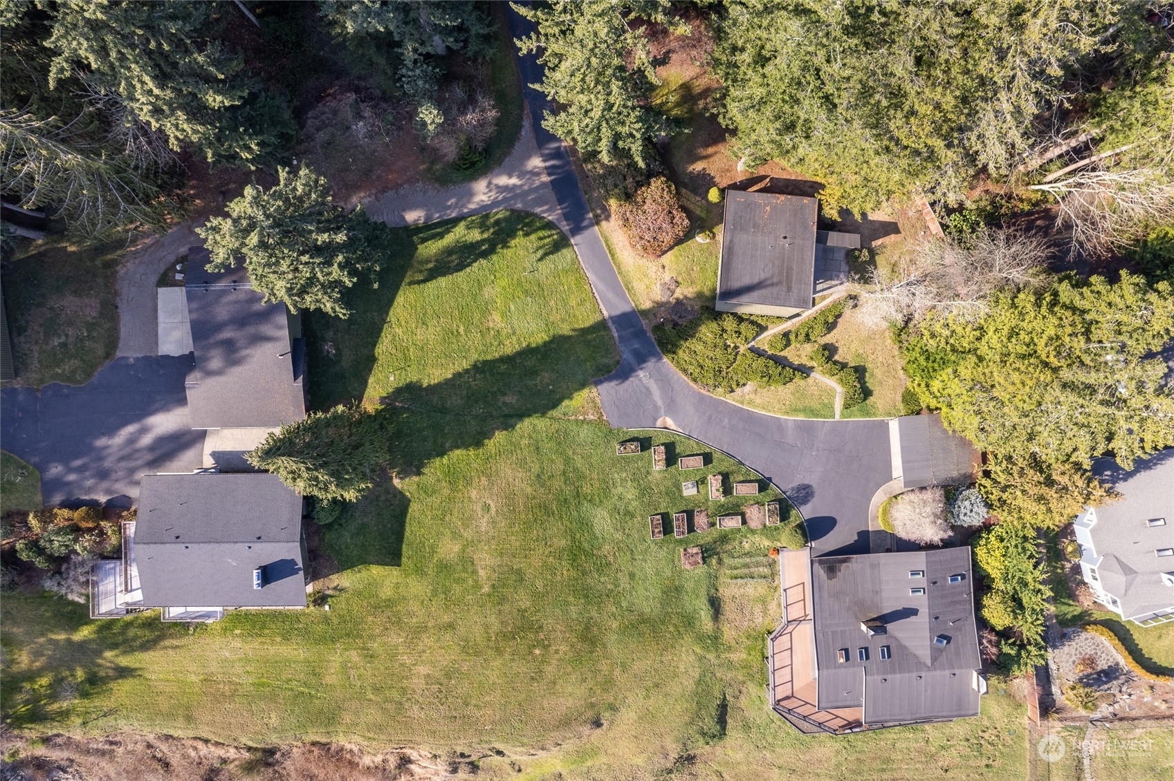 12922 Thomas Road Northwest Gig Harbor, WA 98329 - Photo 37 of 38 an aerial view of a house with a garden