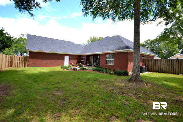 1640 Augusta Drive West Mobile, AL 36695 - Photo 23 of 25 Rear view of home and large backyard space. Roof is one year old.