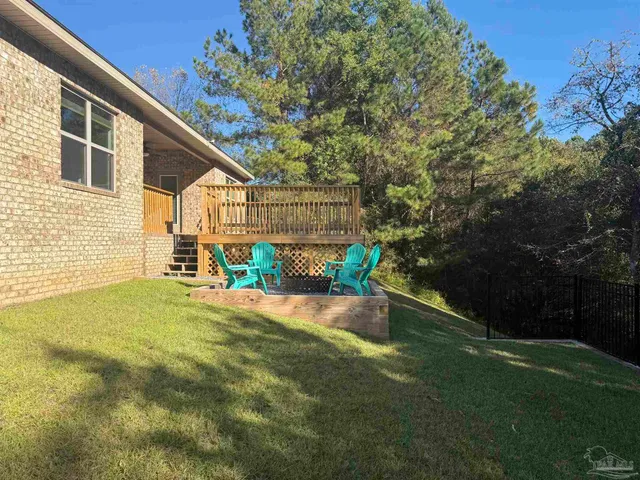 a view of an empty room with an ocean view