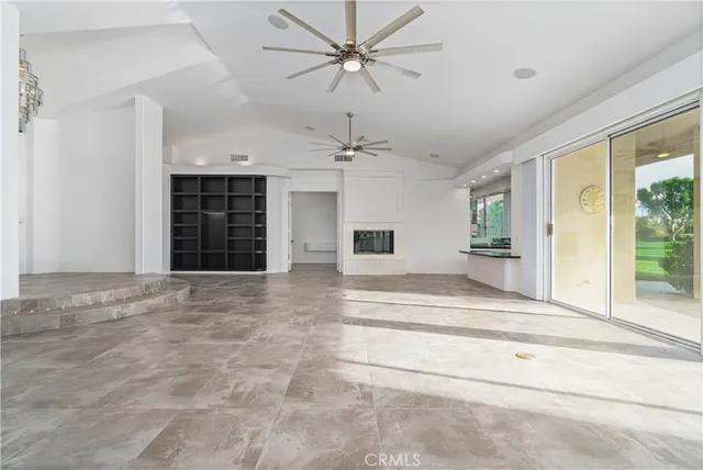 a kitchen with a sink and a large window