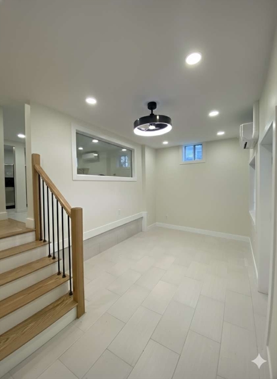 30 Russell Road, Unit 30 Chelmsford, MA 01863 - Photo 19 of 20 a view of a hallway with a chandelier