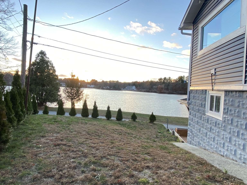 30 Russell Road, Unit 30 Chelmsford, MA 01863 - Photo 3 of 20 a view of lake with mountain in the background