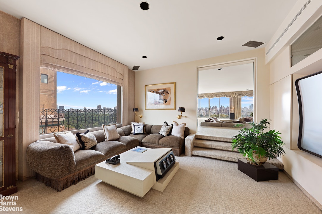 101 Central Park West, Unit PHF Manhattan, NY 10023 - Photo 12 of 27 a living room with furniture and a large window