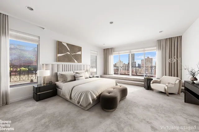 a living room with kitchen island furniture and a table