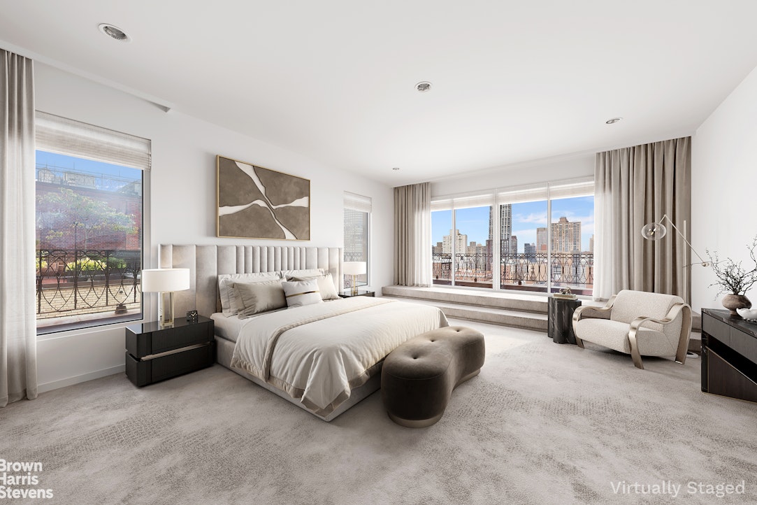 101 Central Park West, Unit PHF Manhattan, NY 10023 - Photo 14 of 27 a spacious bedroom with a bed couch and a large window