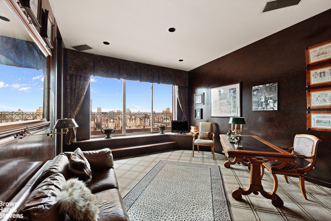 101 Central Park West, Unit PHF Manhattan, NY 10023 - Photo 18 of 27 a living room with furniture and a large window