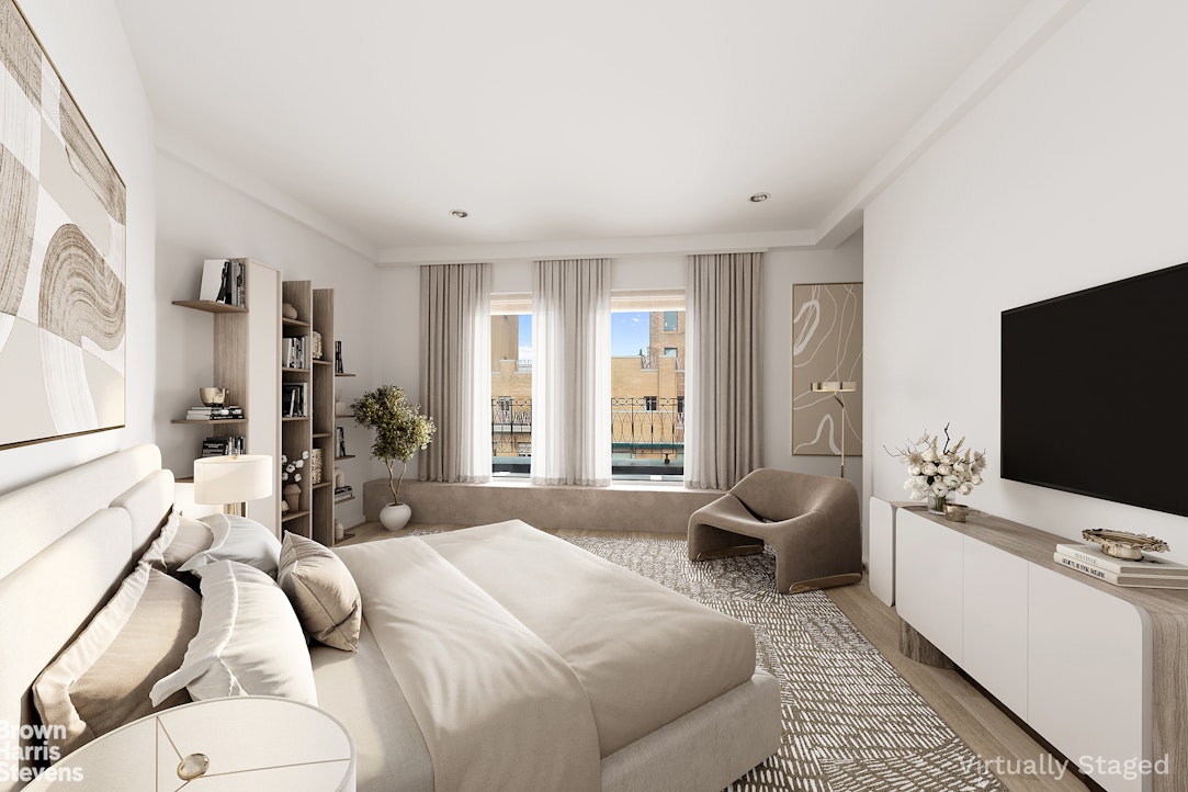 101 Central Park West, Unit PHF Manhattan, NY 10023 - Photo 20 of 27 a bedroom with furniture and a flat screen tv