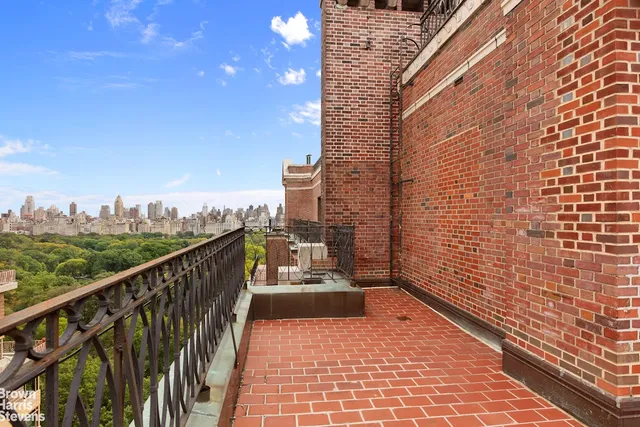 a bedroom with a large bed and a large window