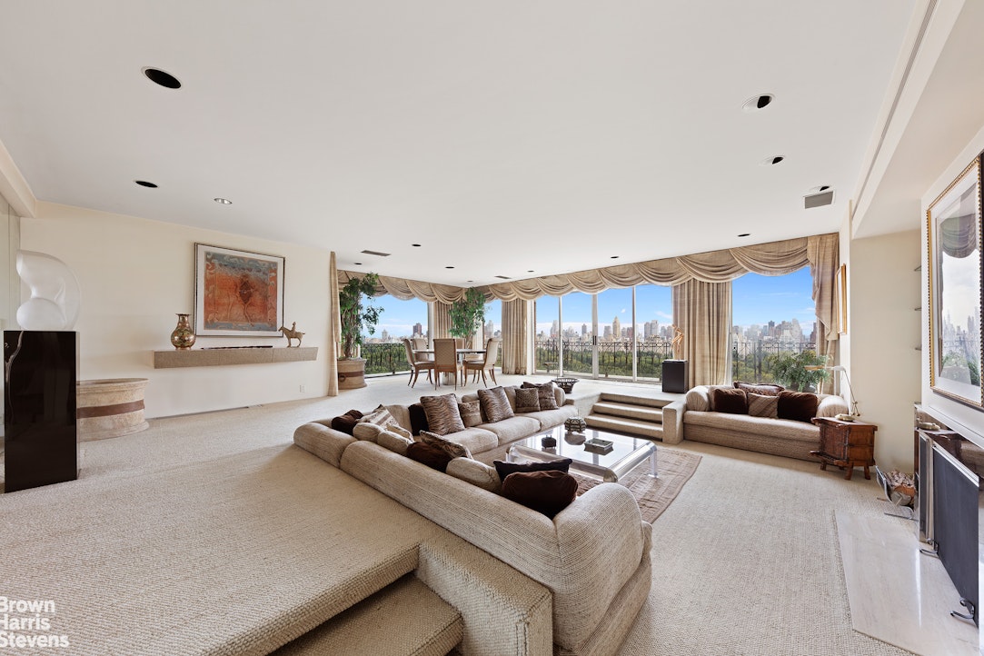 101 Central Park West, Unit PHF Manhattan, NY 10023 - Photo 7 of 27 a living room with furniture and a large window