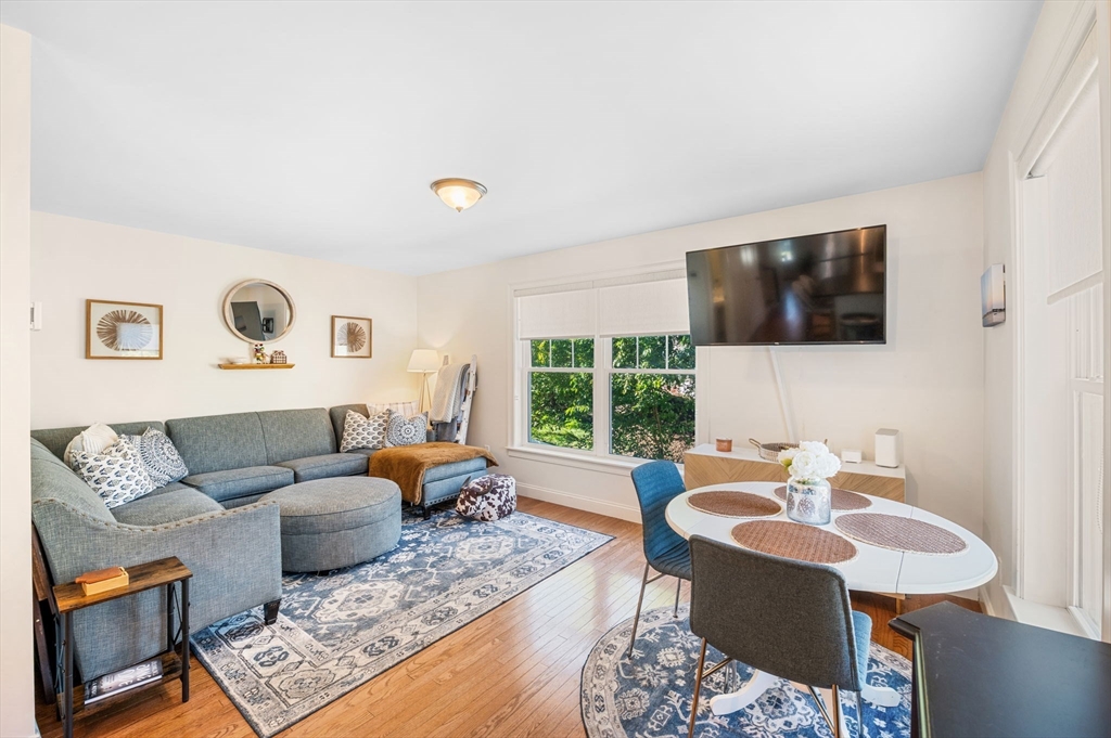 2-4 Gracie Lane, Unit 4 Swampscott, MA 01907 - Photo 16 of 37 a living room with furniture and a flat screen tv