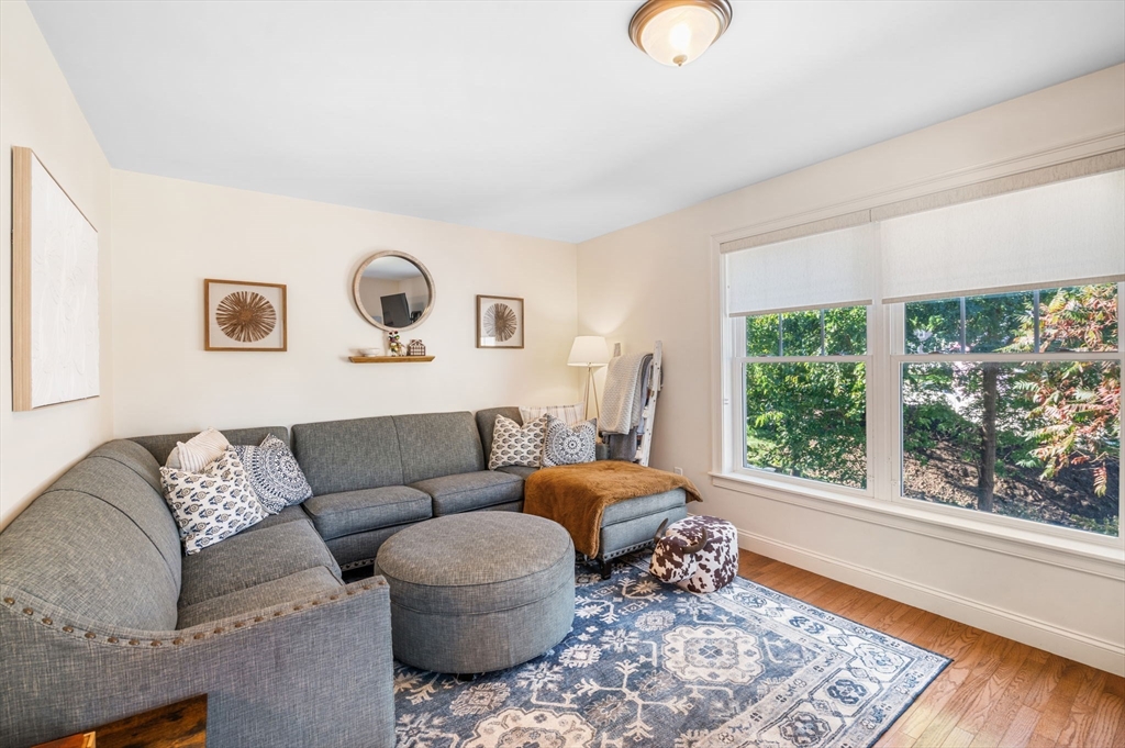 2-4 Gracie Lane, Unit 4 Swampscott, MA 01907 - Photo 19 of 37 a living room with furniture and a large window