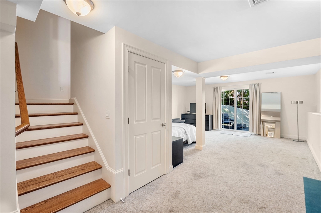 2-4 Gracie Lane, Unit 4 Swampscott, MA 01907 - Photo 28 of 37 a view of a livingroom with furniture and stairs