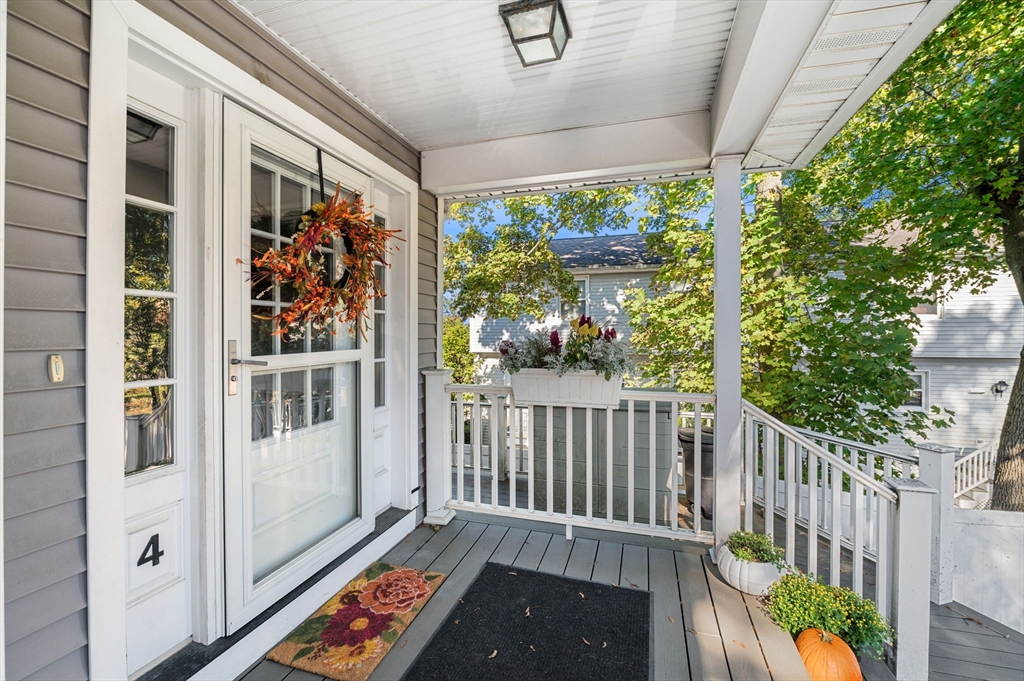 2-4 Gracie Lane, Unit 4 Swampscott, MA 01907 - Photo 3 of 37 a view of a balcony with wooden floor