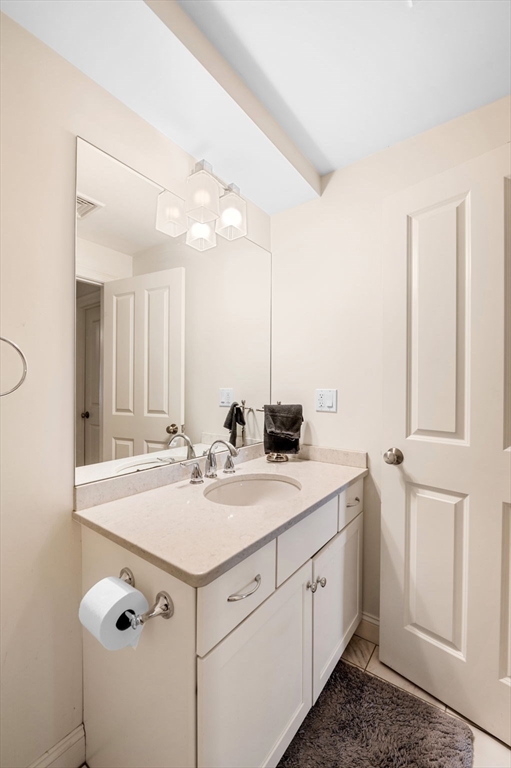 2-4 Gracie Lane, Unit 4 Swampscott, MA 01907 - Photo 33 of 37 a utility room with closet and a sink