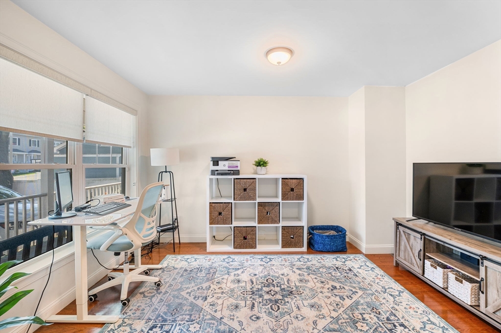 2-4 Gracie Lane, Unit 4 Swampscott, MA 01907 - Photo 9 of 37 a view of a livingroom with furniture and workspace