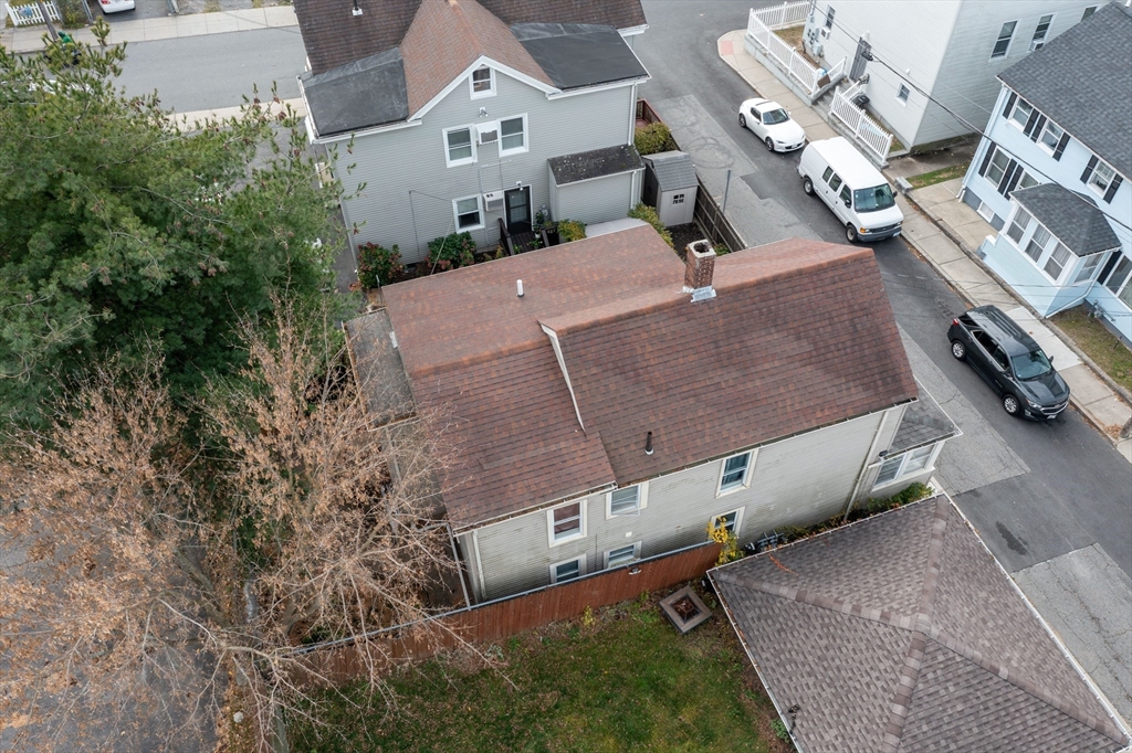 89 Oak Street Fall River, MA 02720 - Photo 32 of 39 an aerial view of a house with a yard