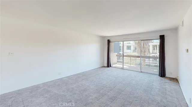 a view of balcony with wooden floor