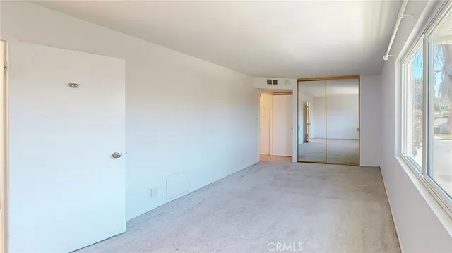 a bathroom with a sink vanity and a mirror