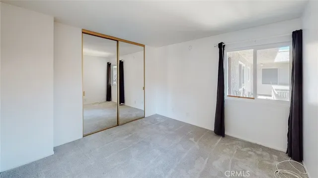 a bathroom with a shower and a toilet