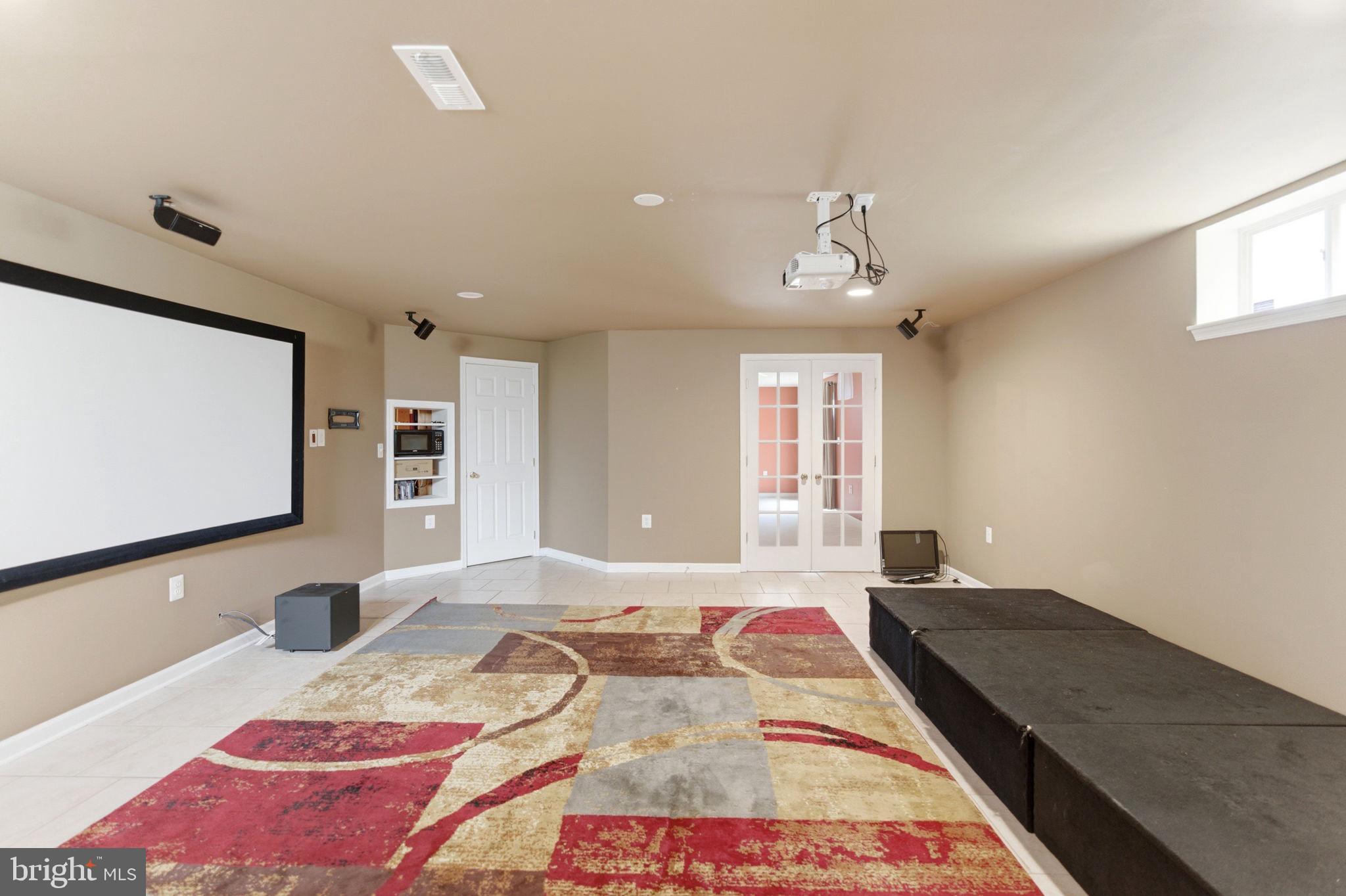 457 Hughs Road Charles Town, WV 25414 - Photo 45 of 73 Spacious media room for entertainment.