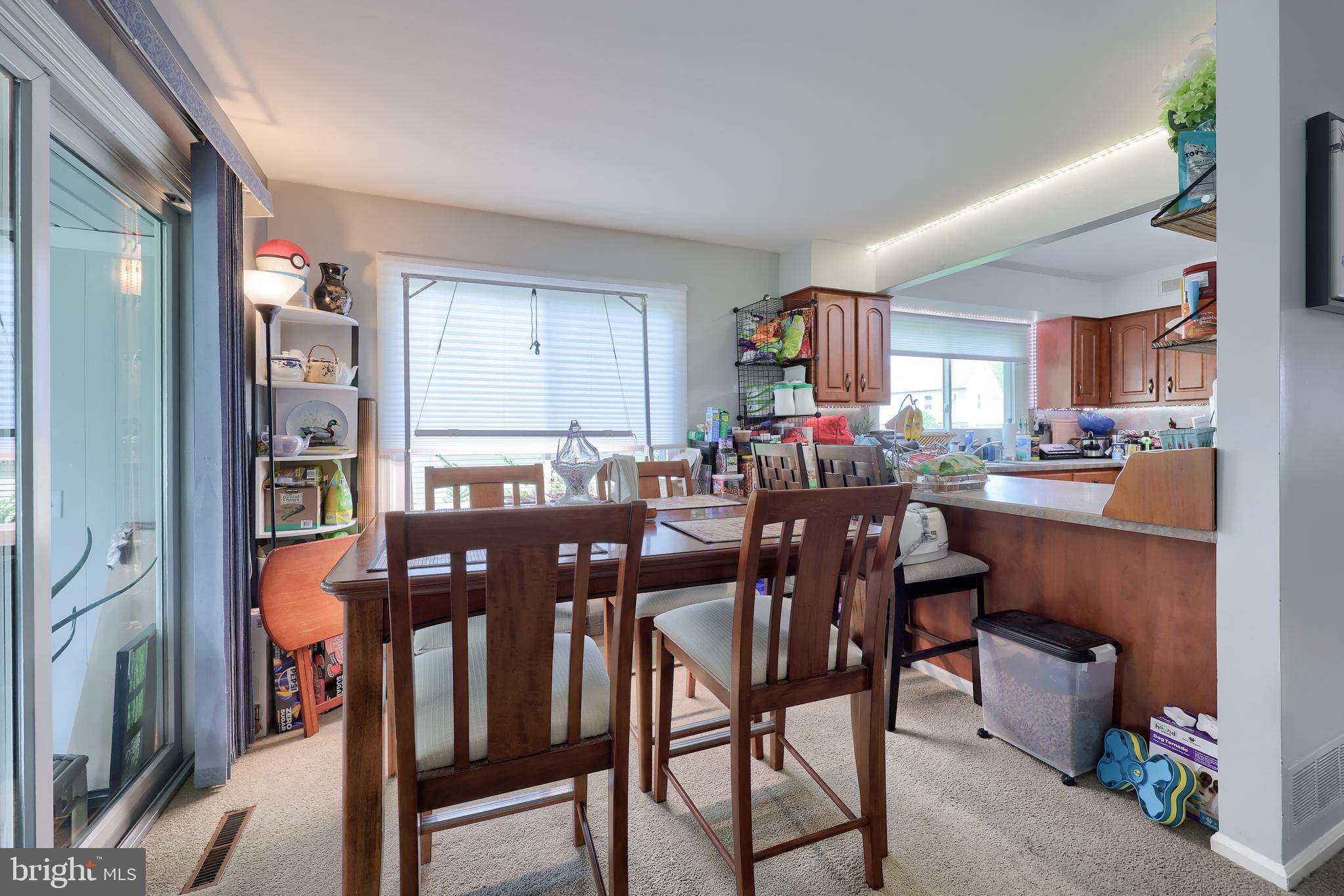 2188 Esbenshade Road York, PA 17408 - Photo 4 of 29 a view of a dining room with furniture and a kitchen