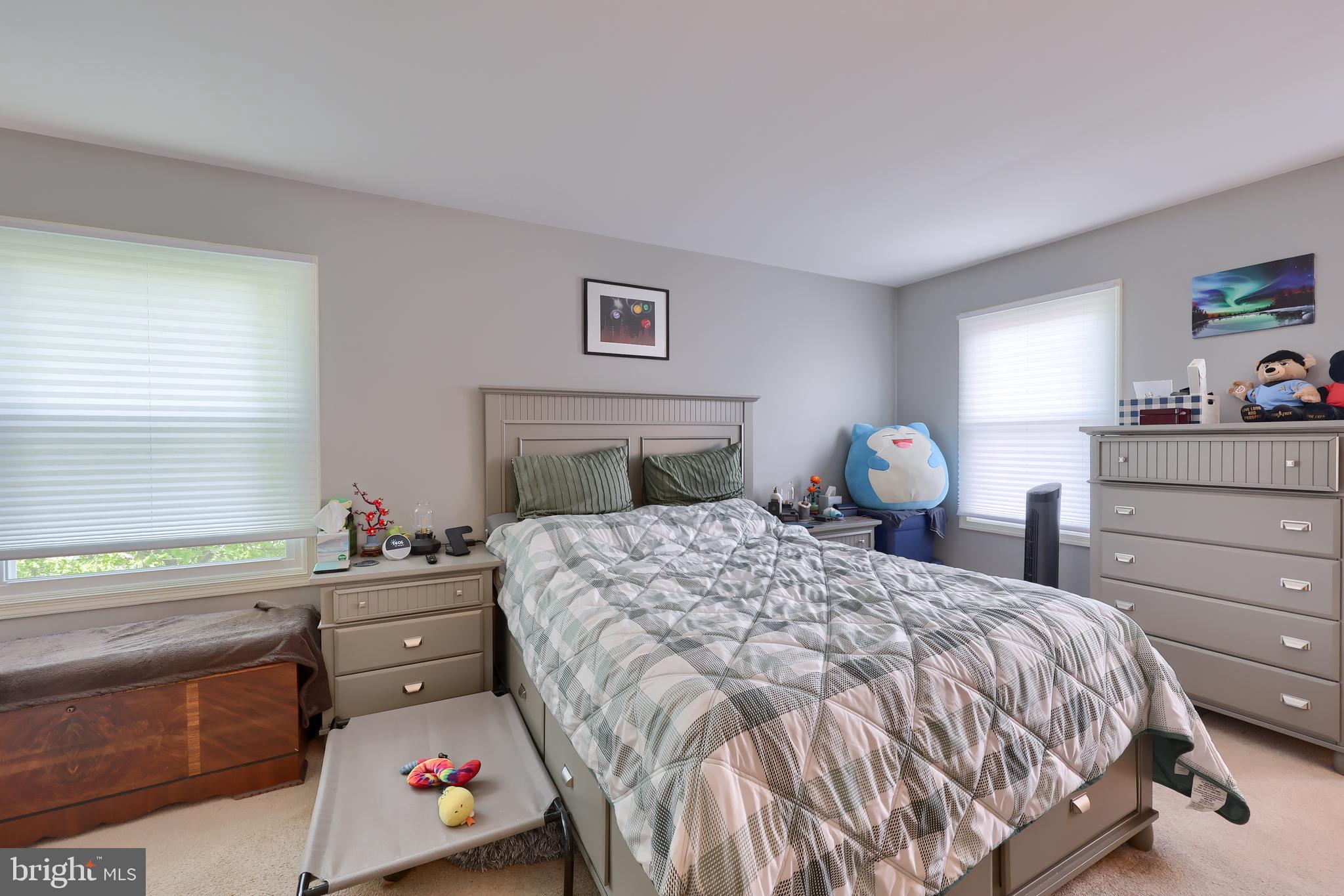 2188 Esbenshade Road York, PA 17408 - Photo 10 of 29 a bedroom with a bed and a dresser