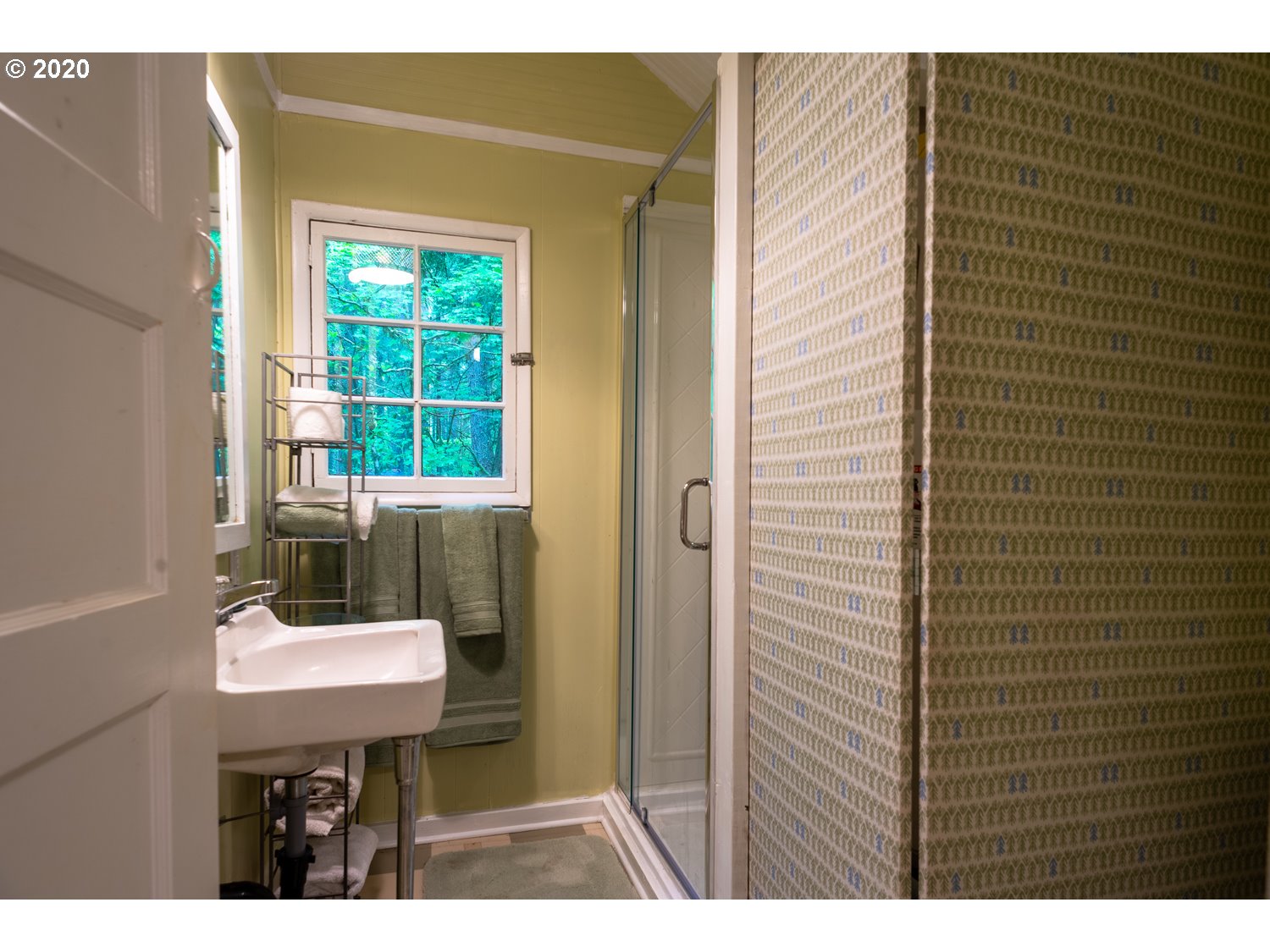 79686 Road 35 A, Unit LOT60 Rhododendron, OR 97049 - Photo 16 of 25 a bathroom with a sink a mirror and a toilet
