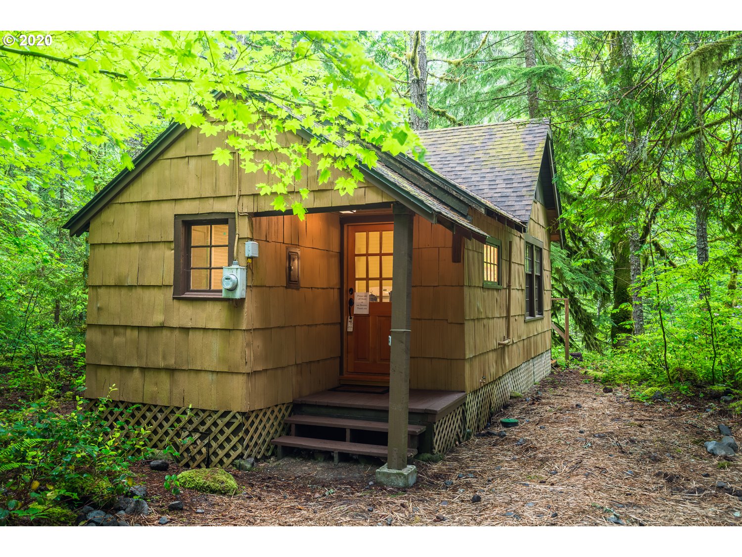 79686 Road 35 A, Unit LOT60 Rhododendron, OR 97049 - Photo 24 of 25 a small house with a trees in the background