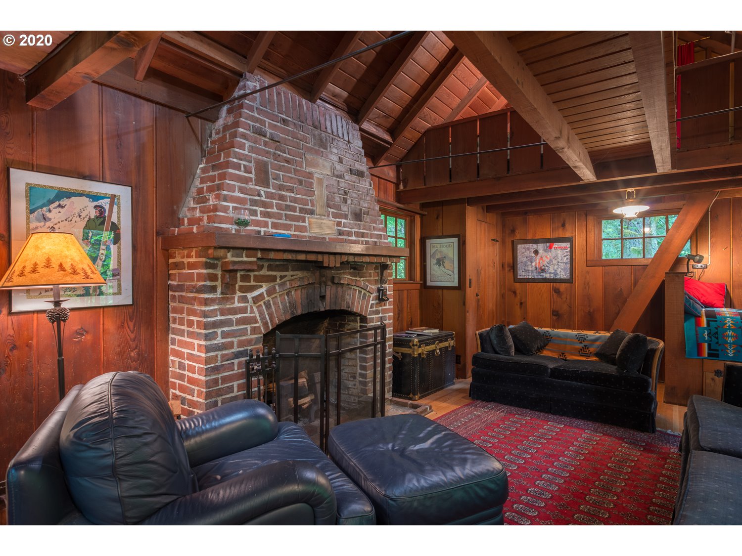 79686 Road 35 A, Unit LOT60 Rhododendron, OR 97049 - Photo 6 of 25 a living room with furniture a flat screen tv and a fireplace
