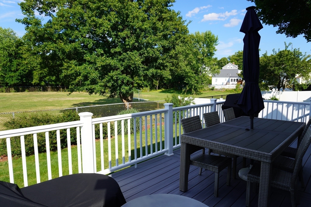 29 Pilgrim Road Weymouth, MA 02191 - Photo 33 of 38 a view of a table and chairs in the garden