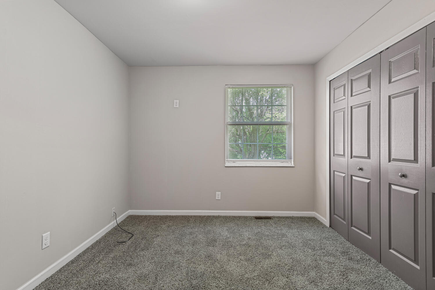 3214 York Drive Champaign, IL 61821 - Photo 16 of 27 an empty room with a window