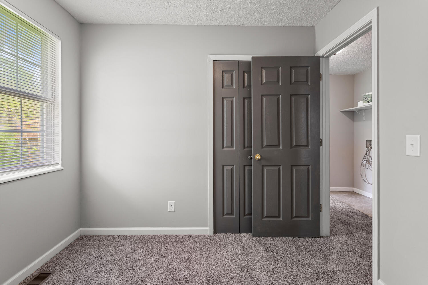 3214 York Drive Champaign, IL 61821 - Photo 18 of 27 an empty room with windows