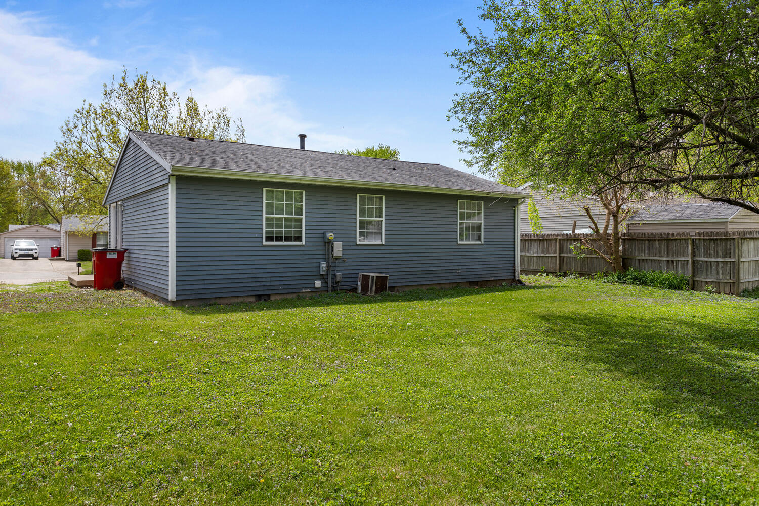 3214 York Drive Champaign, IL 61821 - Photo 24 of 27 a backyard of a house with lots of green space