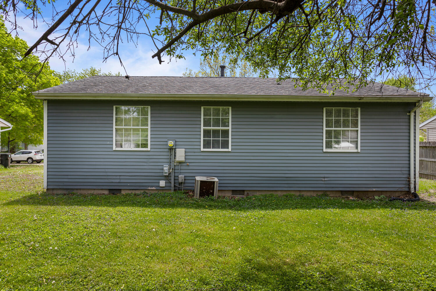 3214 York Drive Champaign, IL 61821 - Photo 25 of 27 a front view of a house with a garden