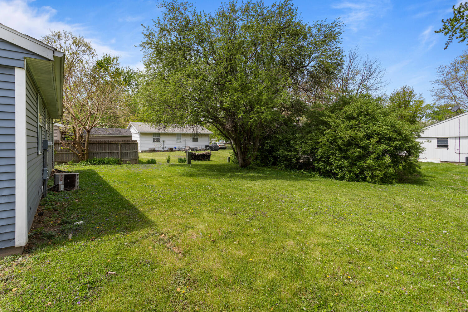 3214 York Drive Champaign, IL 61821 - Photo 26 of 27 a view of a house with a yard