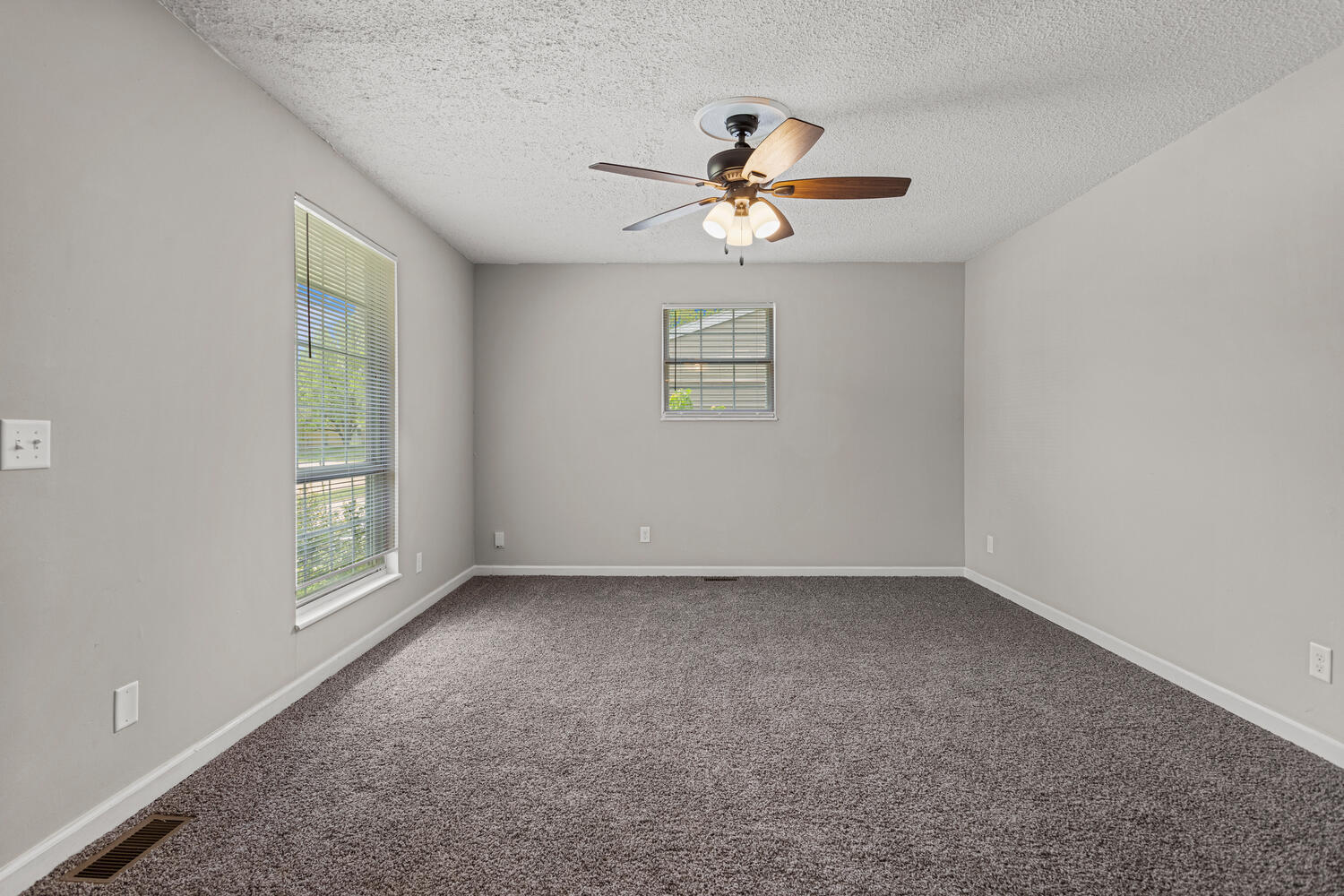 3214 York Drive Champaign, IL 61821 - Photo 6 of 27 a view of an empty room with a window