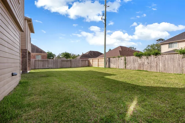 a view of a backyard with a garden