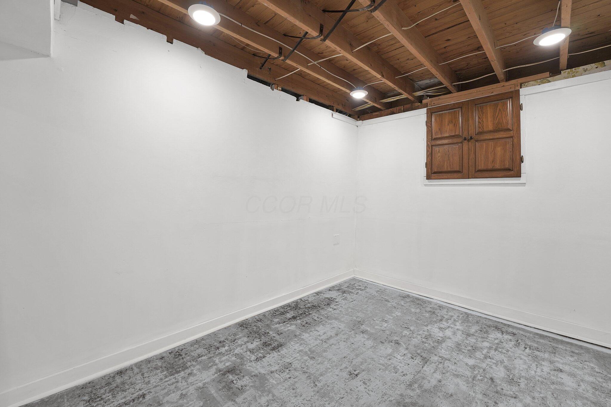5524 Cosgray Road Dublin, OH 43016 - Photo 28 of 35 Basement storage/workshop/hobby area