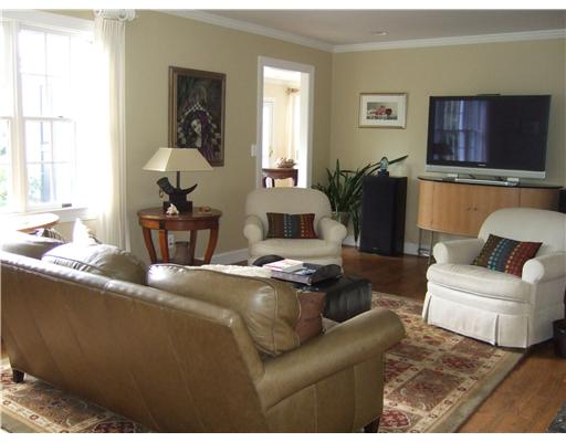 2 Cold Spring Road Barrington, RI 02806 - Photo 5 of 12 Den/Family/Great Room. Family Room off Updated Kitchen with Brick Fireplace and Views of Cove