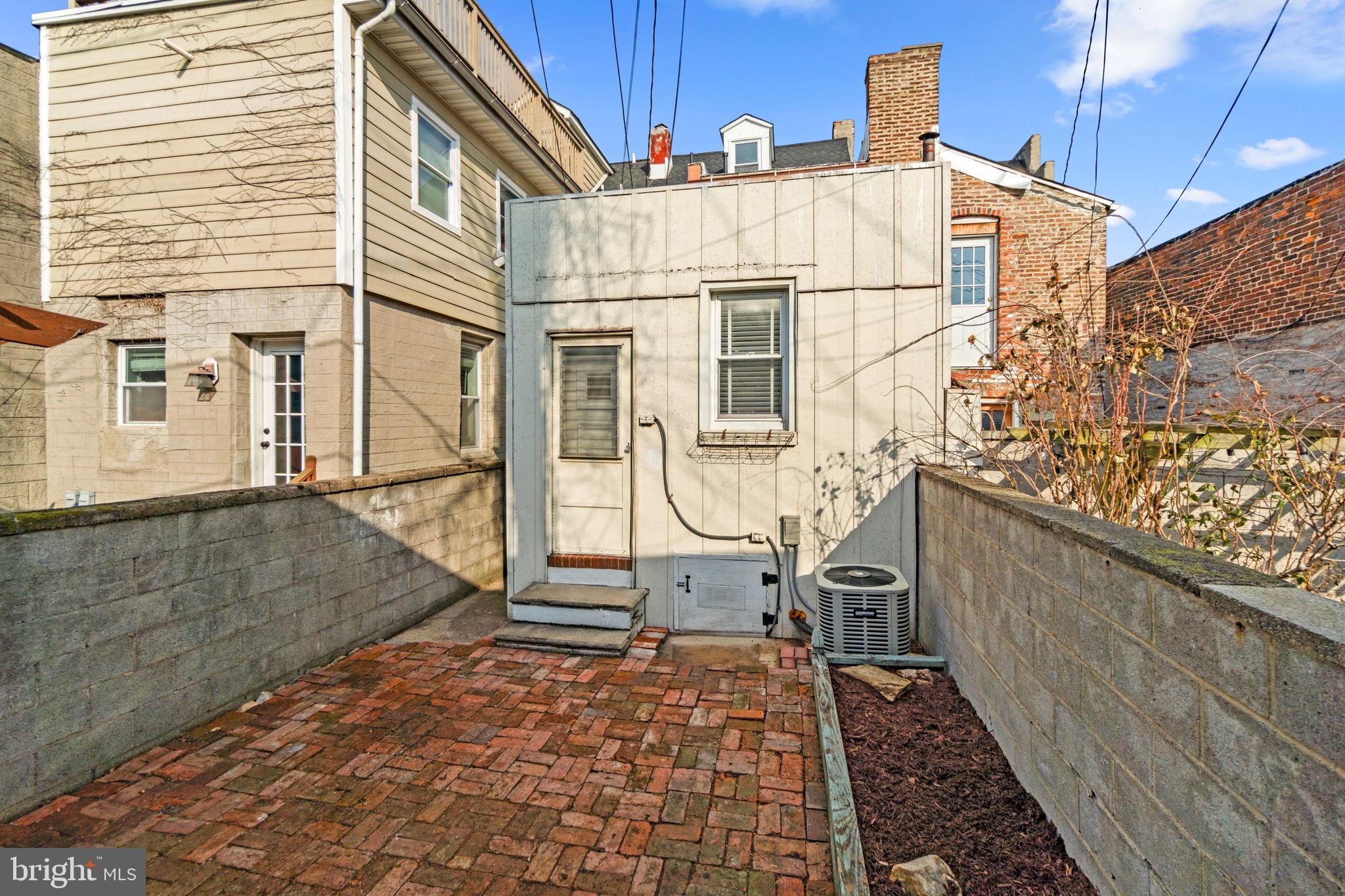 1827 Bank Street Baltimore, MD 21231 - Photo 30 of 31 Charming urban retreat with brick patio.