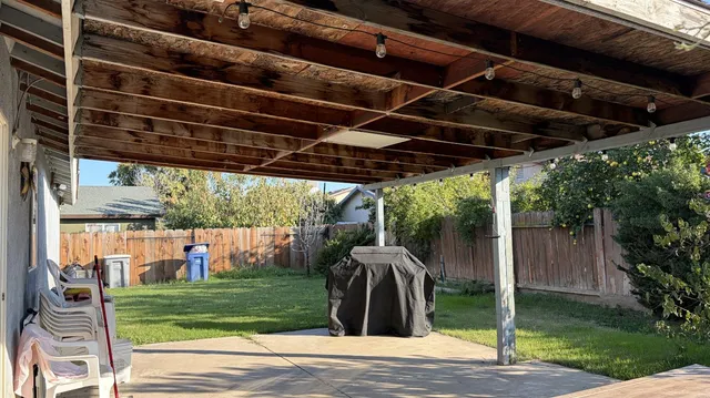a view of a backyard of the house