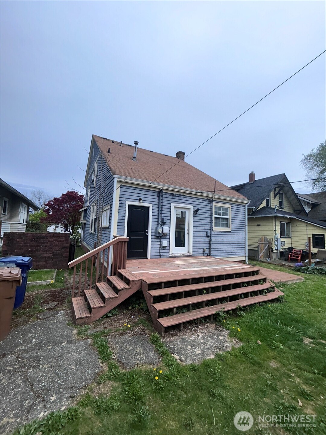 2716 South 14th Street Tacoma, WA 98405 - Photo 22 of 28 a view of a house with a yard and sitting area