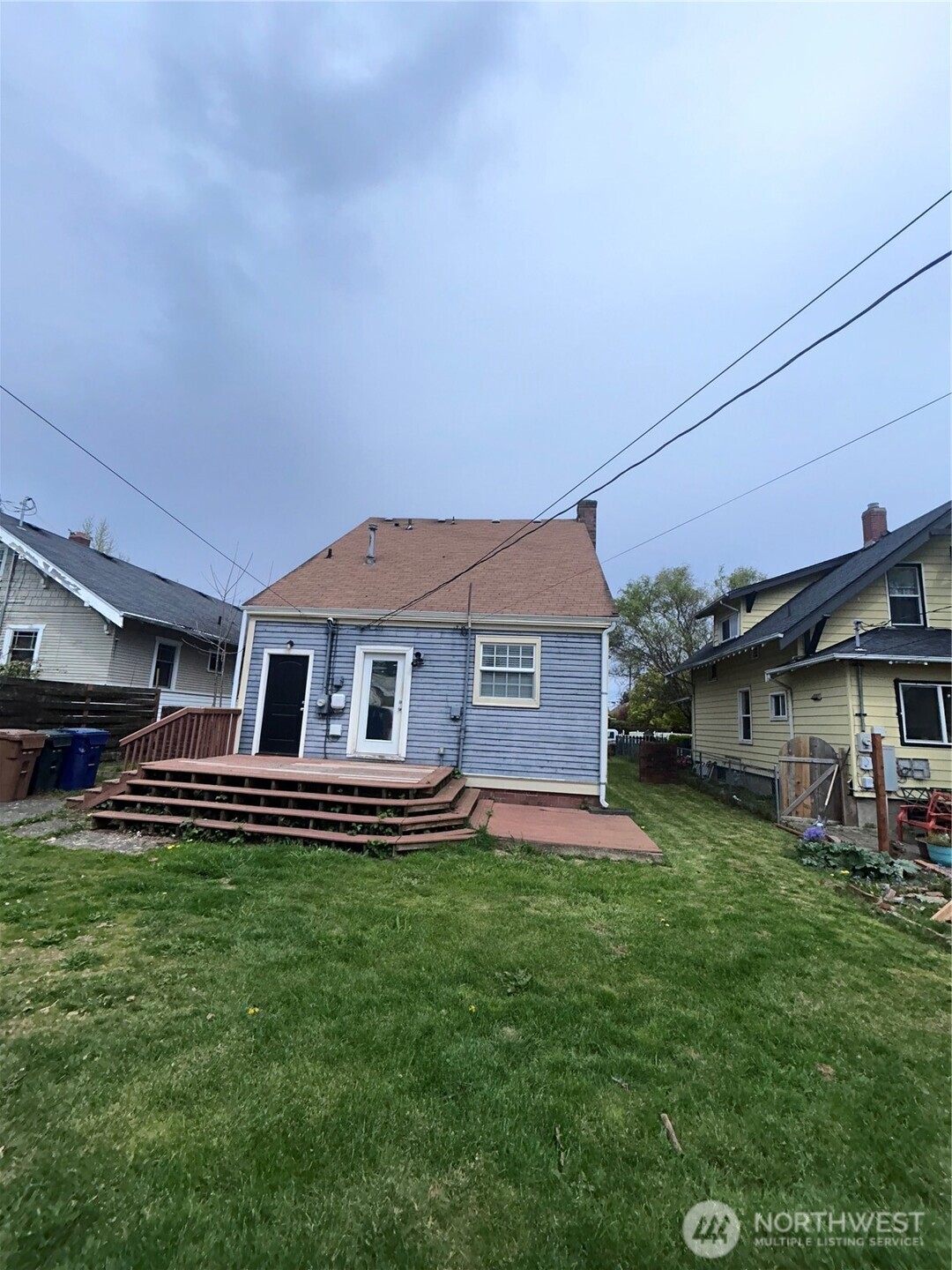 2716 South 14th Street Tacoma, WA 98405 - Photo 23 of 28 a house view with a sitting space and garden