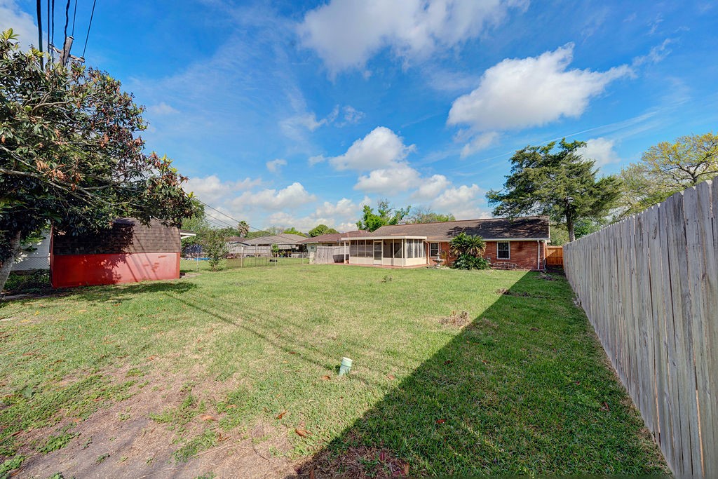 614 Gilpin Street Houston, TX 77034 - Photo 22 of 27 Discover a spacious backyard oasis perfect for entertaining friends and family!