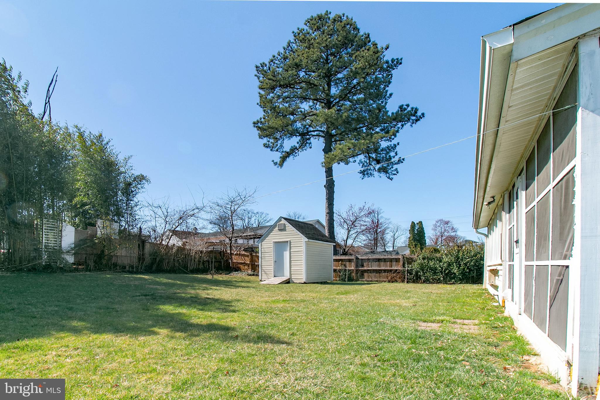 6939 Weston Road Falls Church, VA 22042 - Photo 24 of 25 a front view of a house with garden